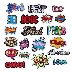 Close-up of colorful pop art style embroidered patches with intricate border stitching