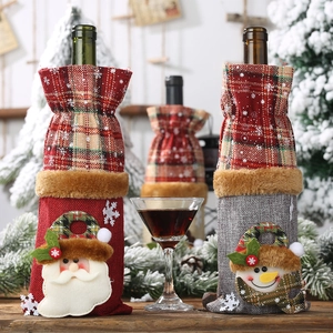 Christmas burlap wine bottle covers with Santa and snowman designs in red and grey plaid