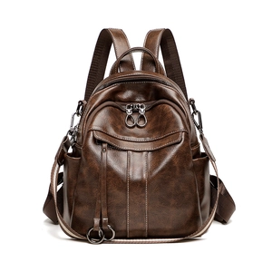 Vintage brown oil wax leather anti-theft backpack with multiple zipper pockets for travel