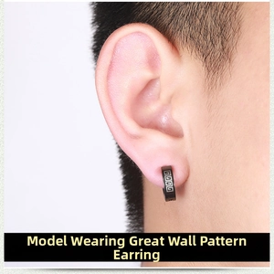 Close-up of black punk ear clip with silver Greek key pattern for non-pierced ears