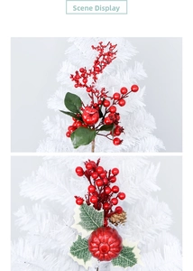 Detail of red Christmas berries with holly leaves and pine cones on a white branch