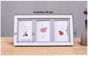 Close-up of white triple multi-photo frame showing detailed wood texture and layout
