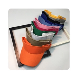 Close-up of colorful stackable sun visors in various vibrant shades for outdoor wear