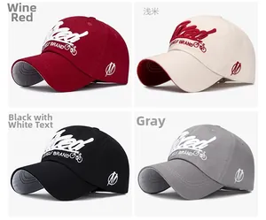 Detail view of four cotton baseball caps with Fixed 3D embroidery in multiple colors