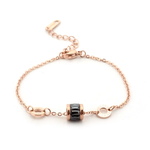 Rose gold titanium steel bracelet featuring roman numeral rings and a black ceramic cylinder
