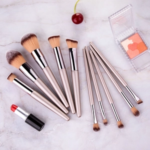 10-piece champagne gold makeup brush set on marble with synthetic bristles