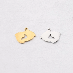 Polished stainless steel baby feet pendants with heart cutouts in gold and silver finish