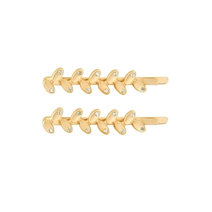 Lot de deux barrettes dorées en forme de feuilles avec cristaux sur fond blanc
