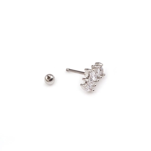 Detailed macro view of silver screw-back stud earrings with marquise-cut zircons