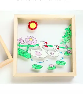 Detail of square wood DIY frame featuring hand-painted lotus pond and swan artwork