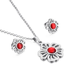 Floral titanium steel jewelry set featuring a silver flower necklace and red gemstone earrings