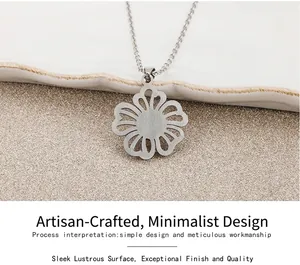 Detailed close-up of hollow flower pendant with matching fine chain in silver steel finish