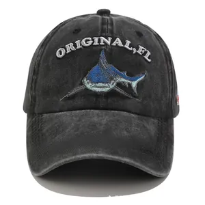 Washed black denim baseball cap with shark embroidery and white original lettering