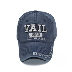 Navy washed cotton baseball cap with vintage Vail 1962 embroidery and curved brim