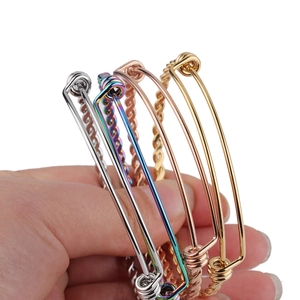 Adjustable twisted steel wire bangles in silver, gold, rose gold and rainbow finishes