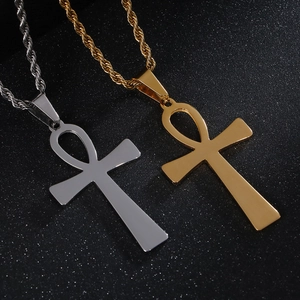 Gold and silver Ankh cross pendant necklaces with twist chains for a hip-hop style