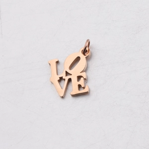 Macro shot of 16x19mm rose gold LOVE hollow pendant with jump ring DIY accessory