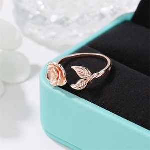Retro rose gold adjustable ring with realistic flower and leaf design in a gift box
