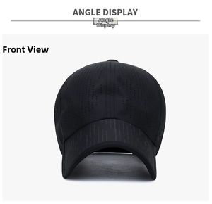 Close-up of laser-cut ventilation holes on black quick-dry sports cap from front angle