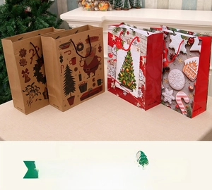 Detailed view of assorted Christmas gift bags in kraft and red with festive holiday motifs