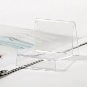 Detailed side view of a clear acrylic display stand with L-shaped support structure