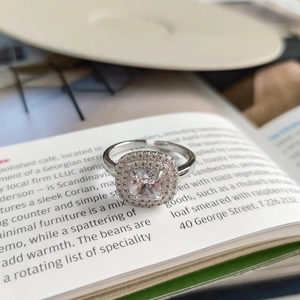 Detailed view of S925 sterling silver ring featuring a cushion-cut halo zircon stone