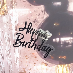 Close-up of double-layer transparent acrylic Happy Birthday cake topper for party