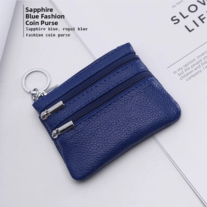 Sapphire blue genuine leather coin purse with triple zipper pockets and a metal keychain