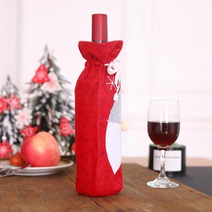 Christmas gnome wine bottle cover with red felt, white beard and snowflake embroidery
