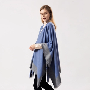 Detail of soft blue and grey color-block shawl wrap with high-quality warm fabric