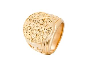 Macro shot of gold Saint Benedict exorcism cross relief on stainless steel ring