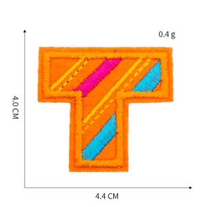 Detailed embroidery patch showing letter T dimensions 4.0x4.4 cm in orange and blue