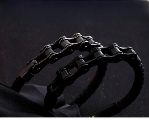 Macro detail of industrial matte black mechanical chain link bracelet with rugged texture
