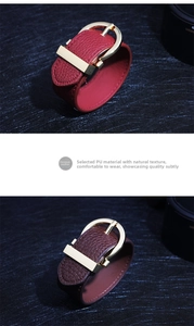 Detail of red and brown PU leather bracelets with golden horseshoe buckle and texture