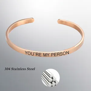 Rose gold minimalist stainless steel open bangle with You're My Person engraving