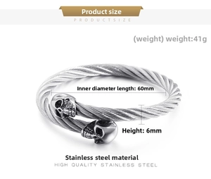 Detail view of 6mm steel wire bracelet showing skull motifs and 41g weight specs