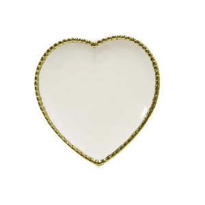 Elegant heart-shaped white ceramic jewelry tray with decorative gold beaded edge detailing