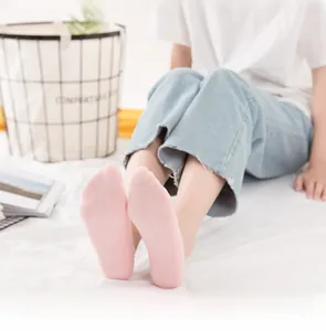 Close-up of pink cotton invisible no-show socks with non-slip silicone and seamless design