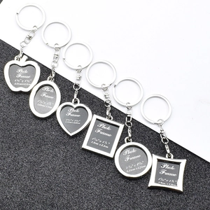 Silver metal photo frame keychains in apple, heart, square and round shapes set