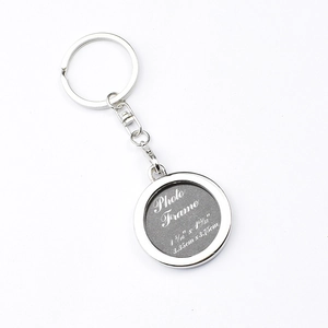 Macro view of silver square photo frame keychain showing internal insert dimensions