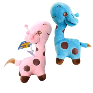 Pink and blue stuffed giraffe plush toys with dark spots on a clean white background