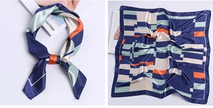 Detailed view of square satin scarf with geometric prints and styling on neck