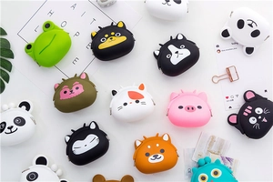 Top view of colorful silicone cartoon animal coin purses with metal snap closures