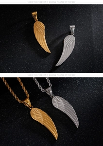Close-up of gold and silver feather pendants with textured details on thick rope chains