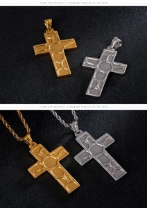 Detail view of gold and silver cross pendants with textured geometric patterns on twist chains