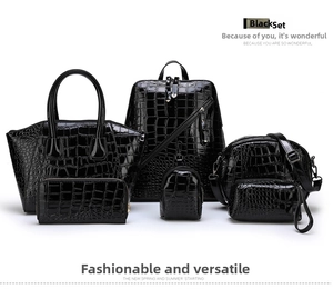 Detail of 6-piece black set featuring faux crocodile texture and glossy PU leather finish