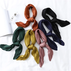 Pleated faux silk scarf set in six vibrant colors styled in elegant bow knots