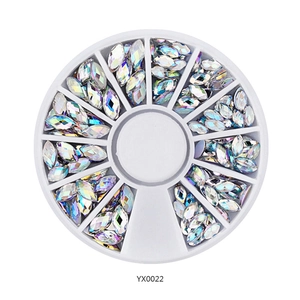 Detail showing multi-color marquise rhinestones for nail art in a circular storage box