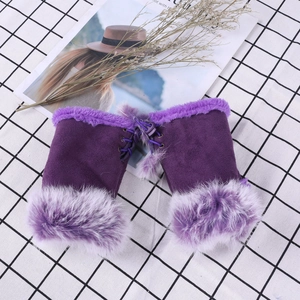 Detail view of purple faux suede fingerless gloves with plush fur trim and drawstring