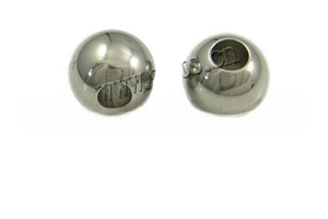 Macro detail of silver stainless steel spacer beads with a smooth polished finish